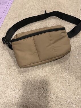 Calpak Luka Belt bag in Chocolate color